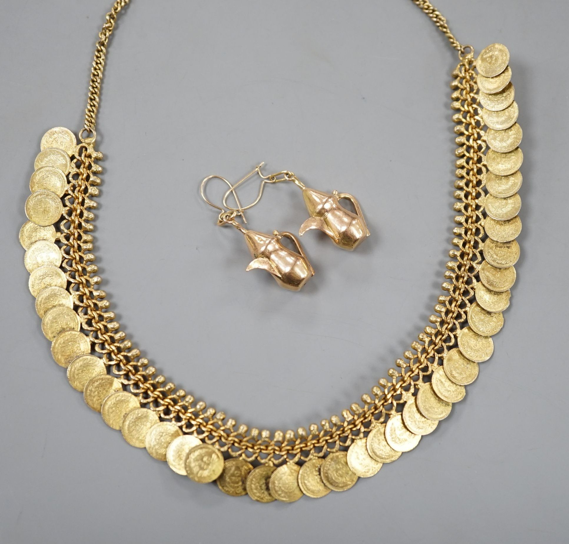 A pair of yellow metal novelty earrings, modelled as pouring vessels, 26mm, 4.3 grams and a gilt metal 'coin' necklace.